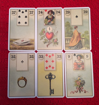 A spread of six cards from the Lenormand Oracle